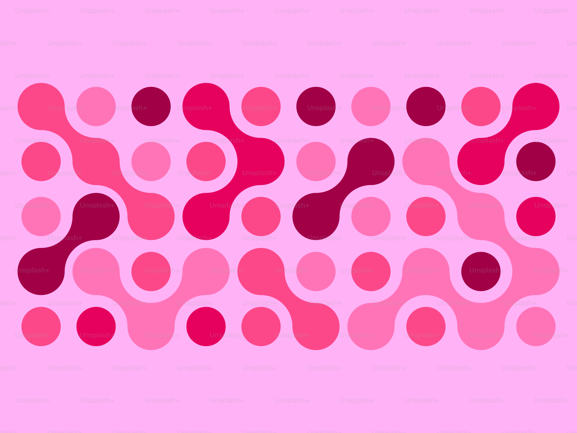 Motif abstrait de cercles reliés rose et rouge.