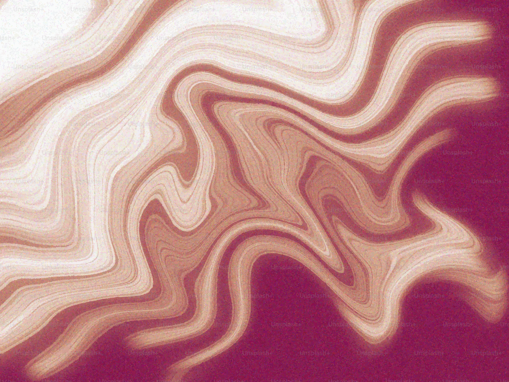 Abstract swirls of pink and white paint