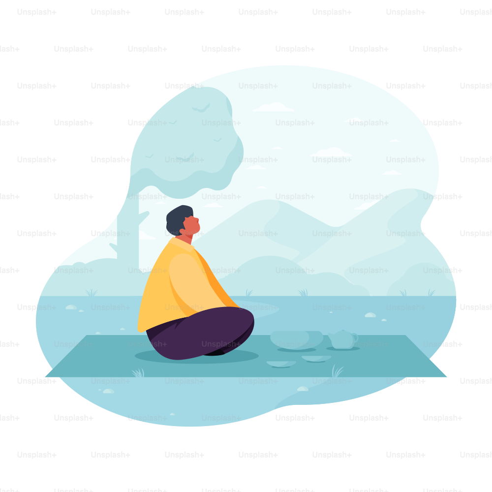 Man meditating outdoors with mountains in background