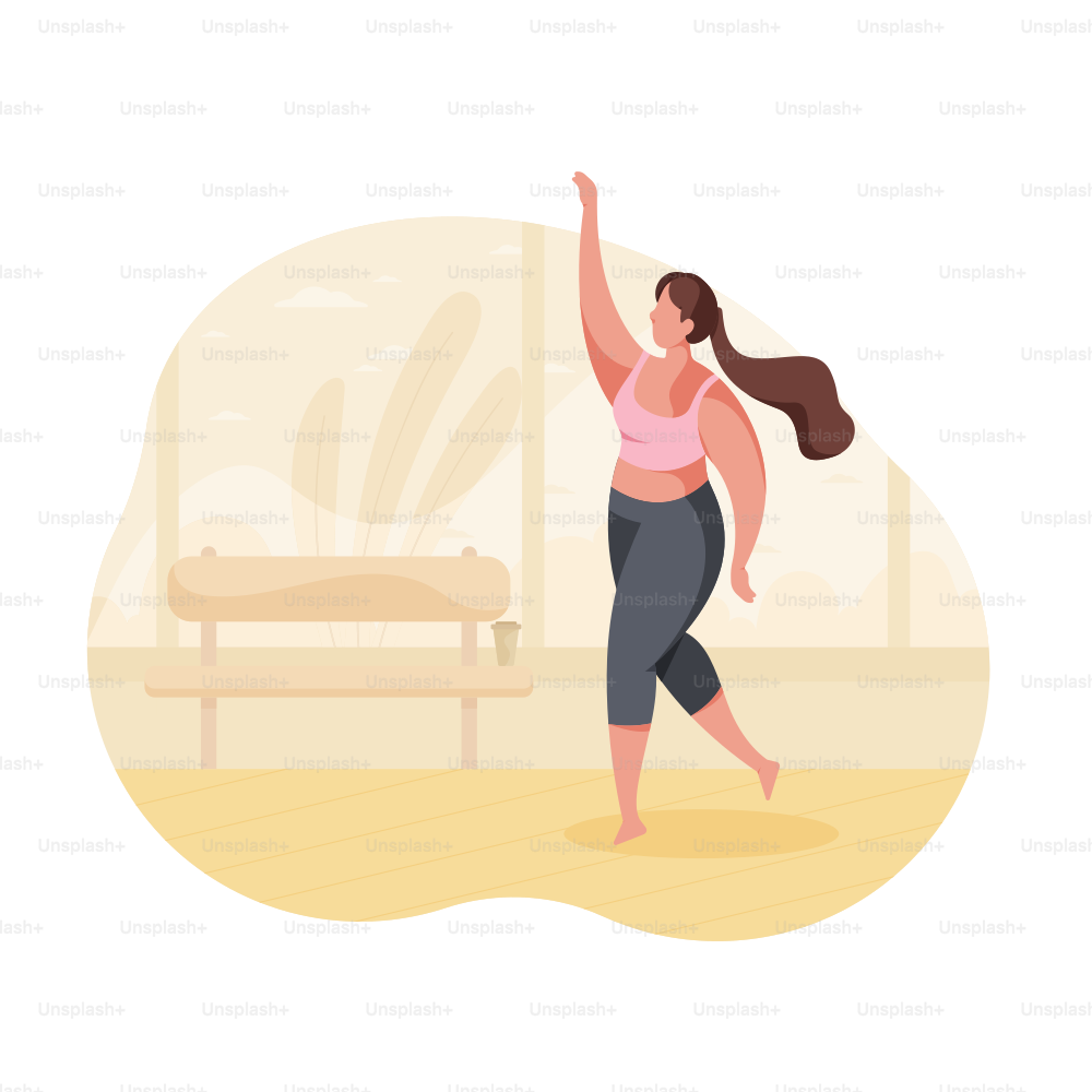 Una mujer con ropa deportiva bailando en un estudio.