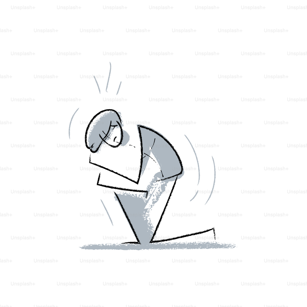 Person kneeling and holding their head