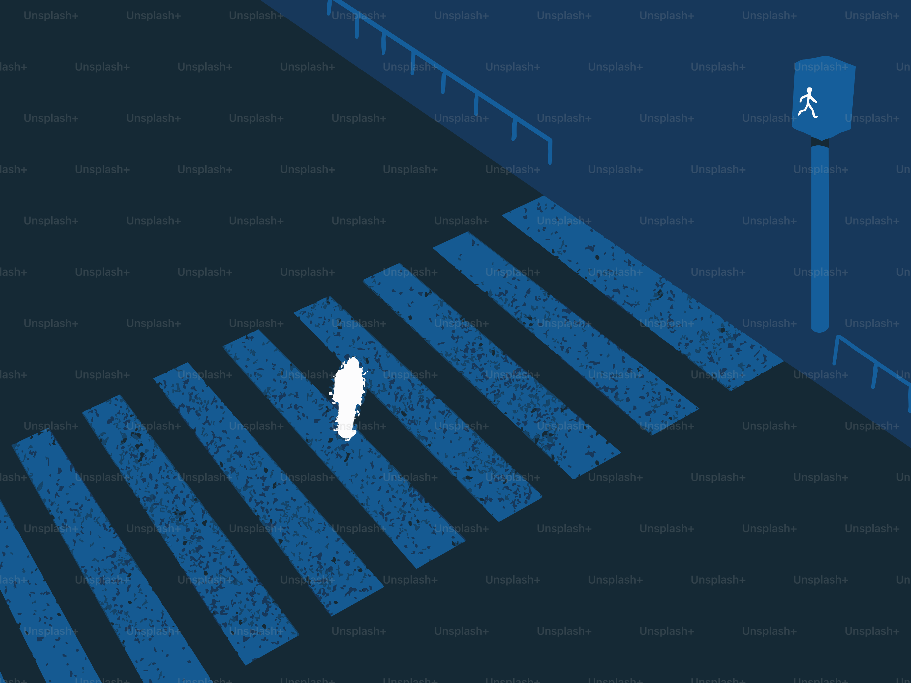 Une silhouette solitaire traverse un passage piéton sombre la nuit.