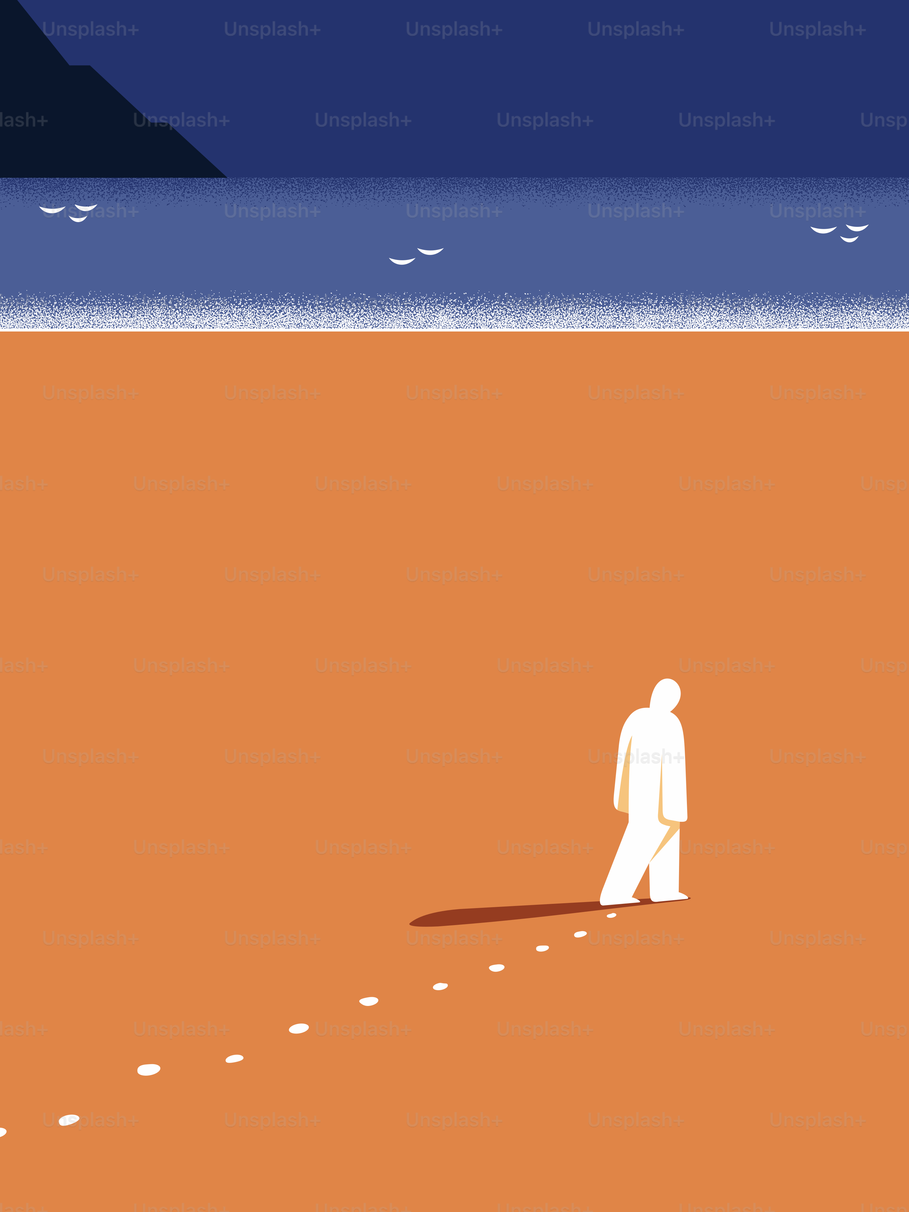 一人の人物が浜辺を歩き、足跡を残します。