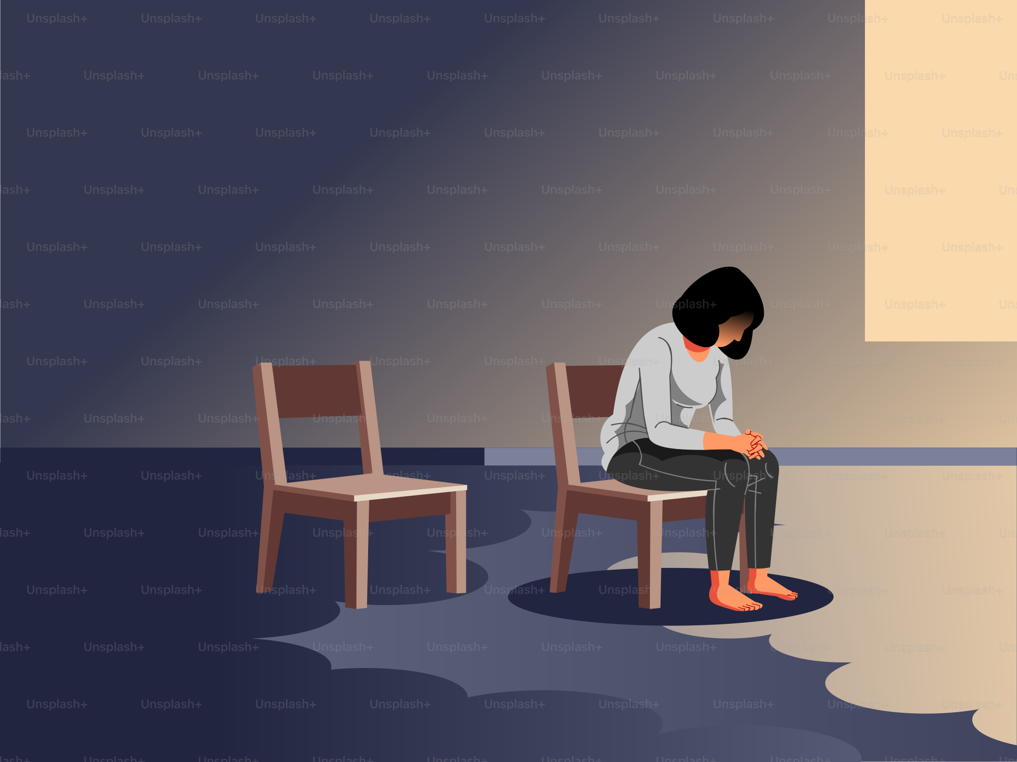 Una donna seduta da sola su una sedia.