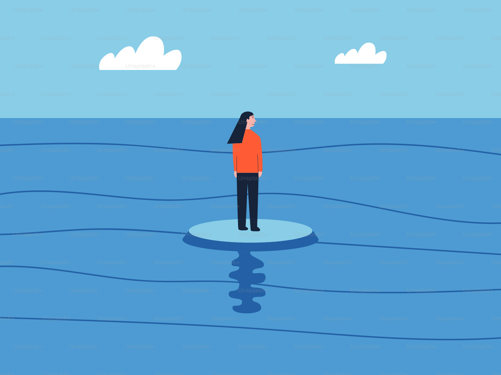 海の小さな島に一人立つ女性。