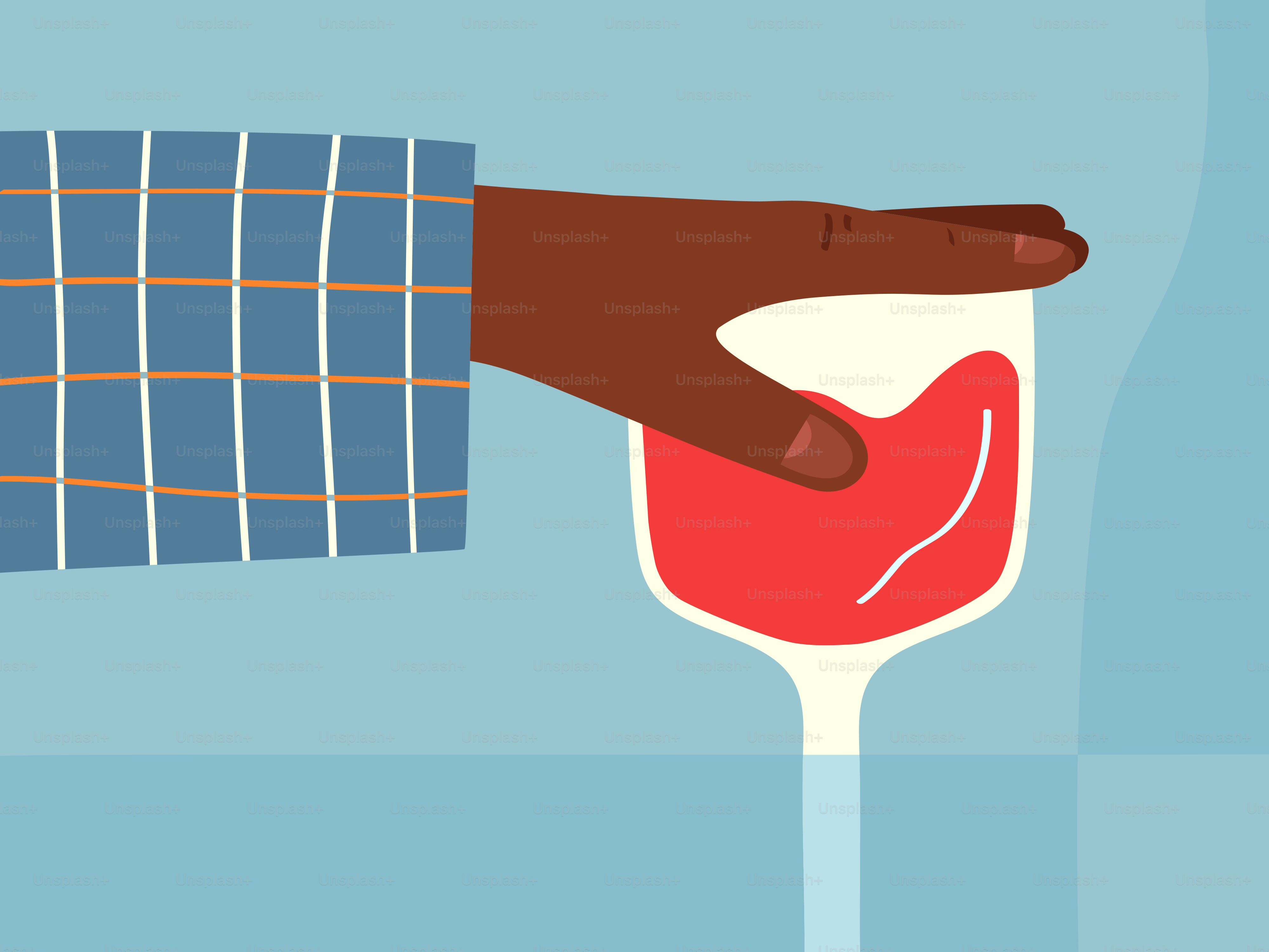 Mano sosteniendo una copa de vino tinto