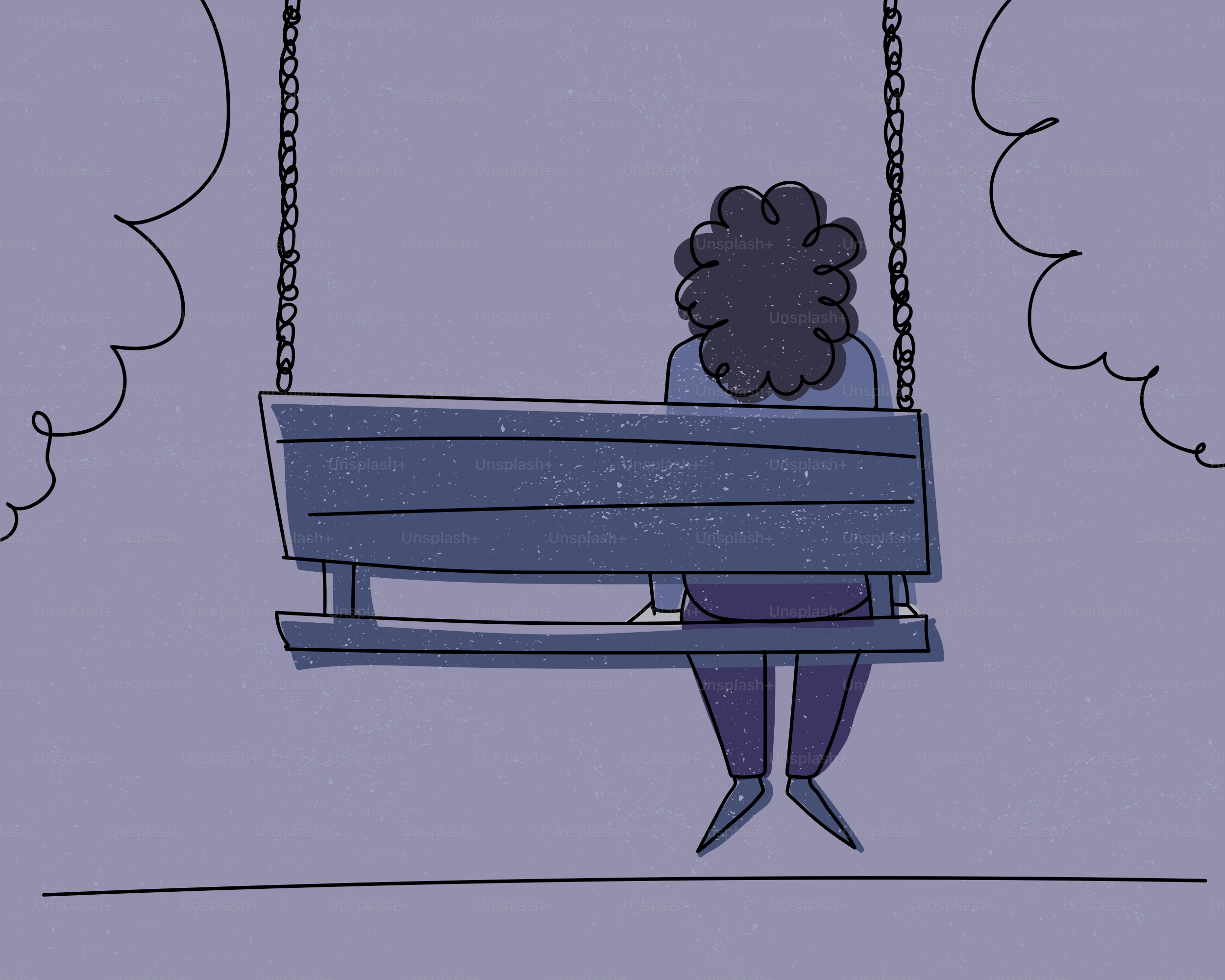 ブランコに一人で座っている人