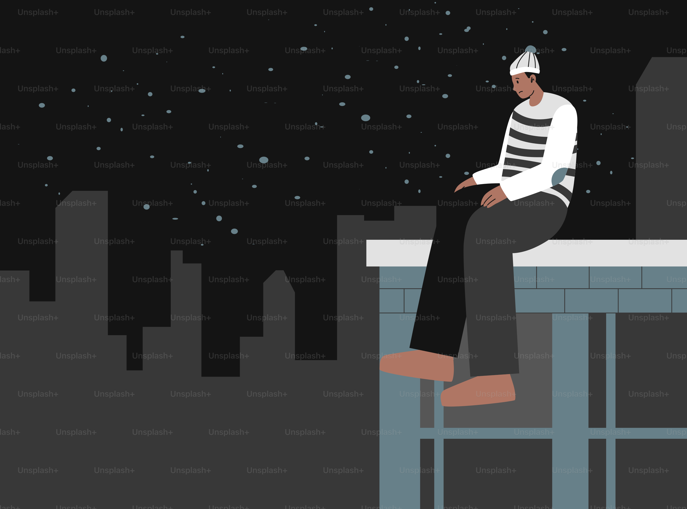 夜の街を見下ろす屋上に座る男。