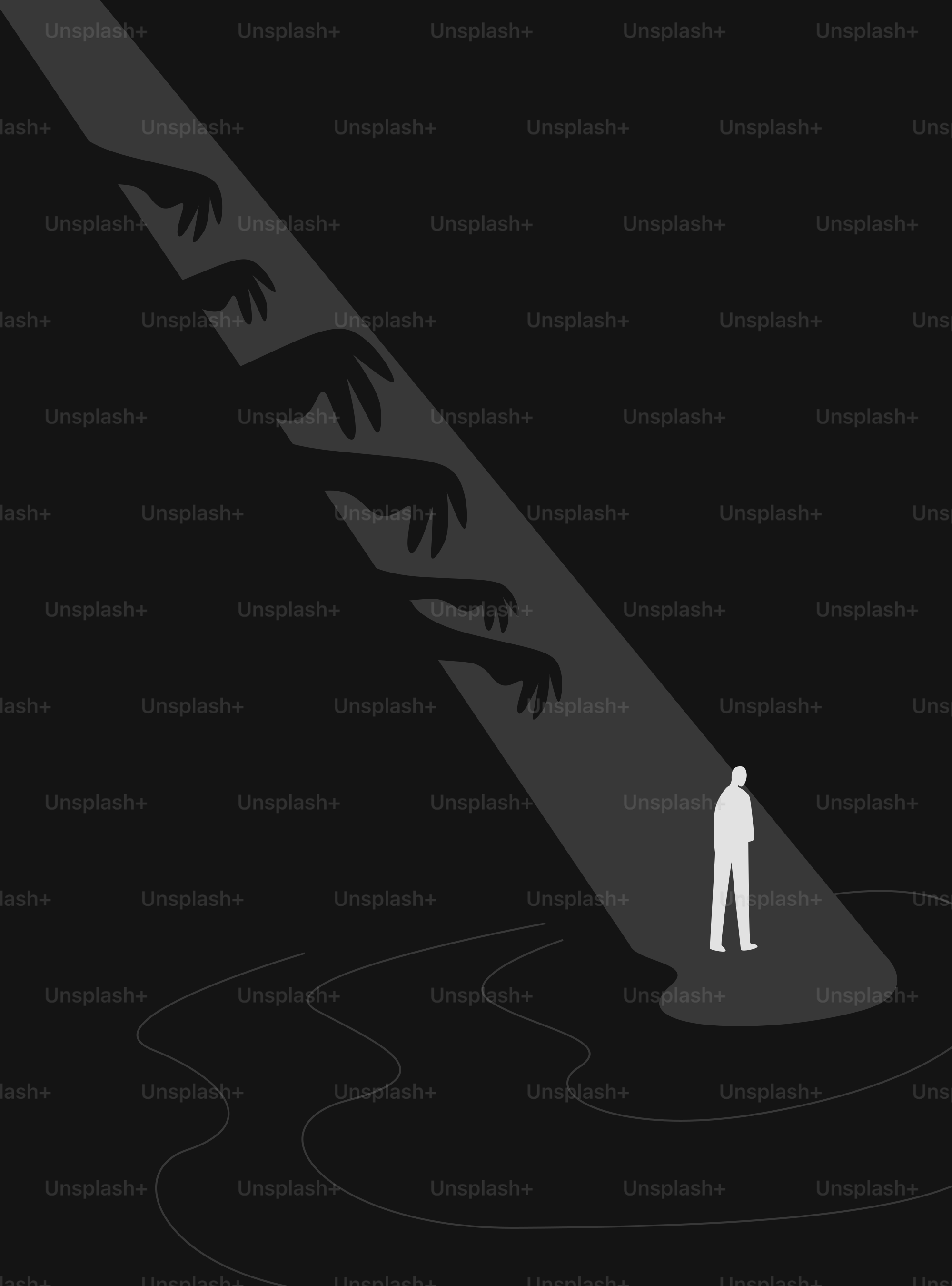 影の手を差し伸べたスポットライトの下の男