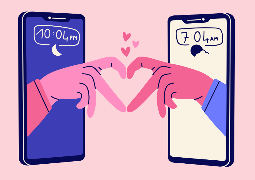 Two hands forming a heart through phone screens