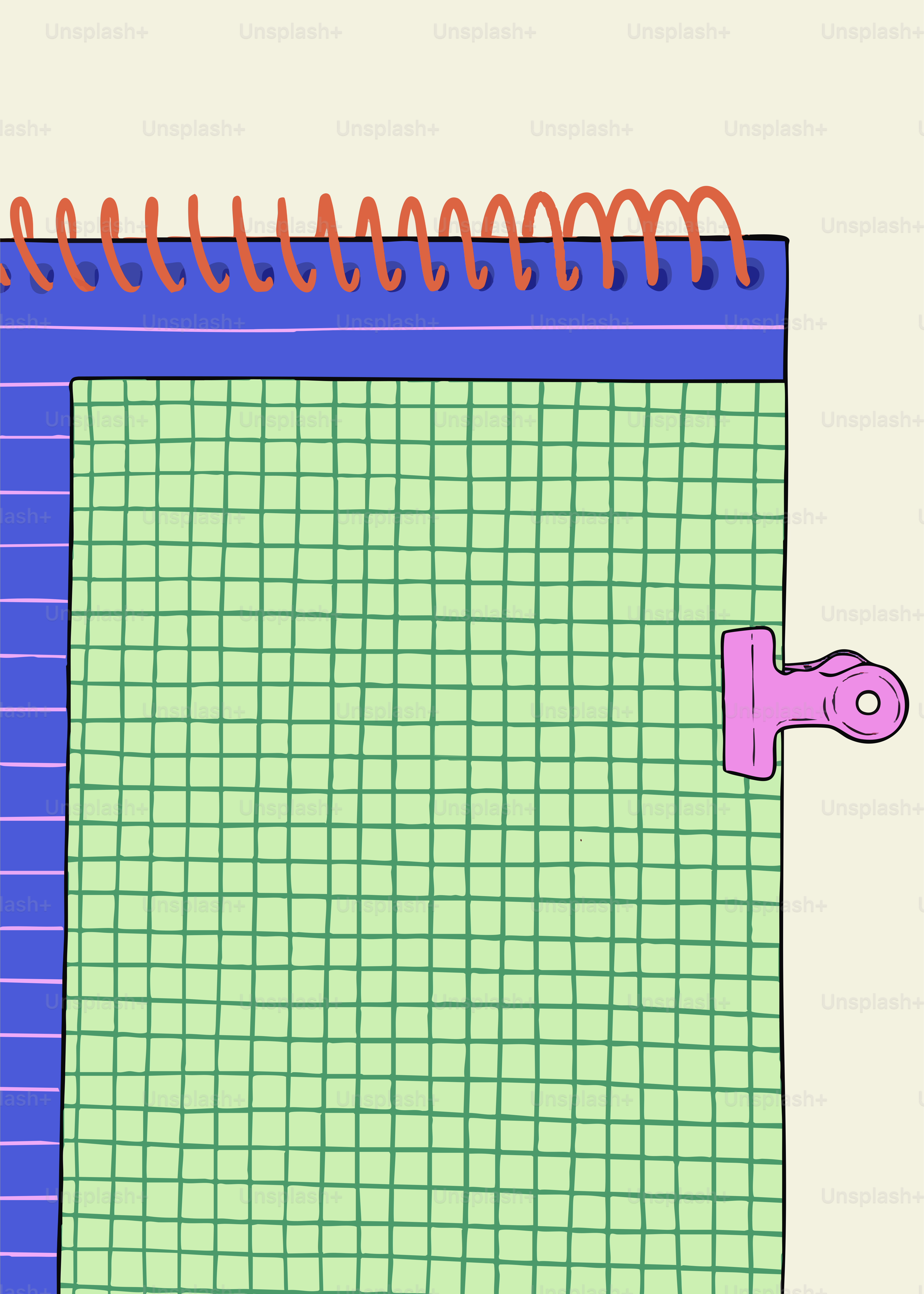 Un quaderno con una molletta rosa che teneva carta verde.