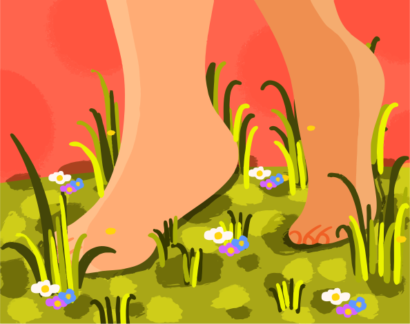 Pés descalços caminhando pela grama com pequenas flores