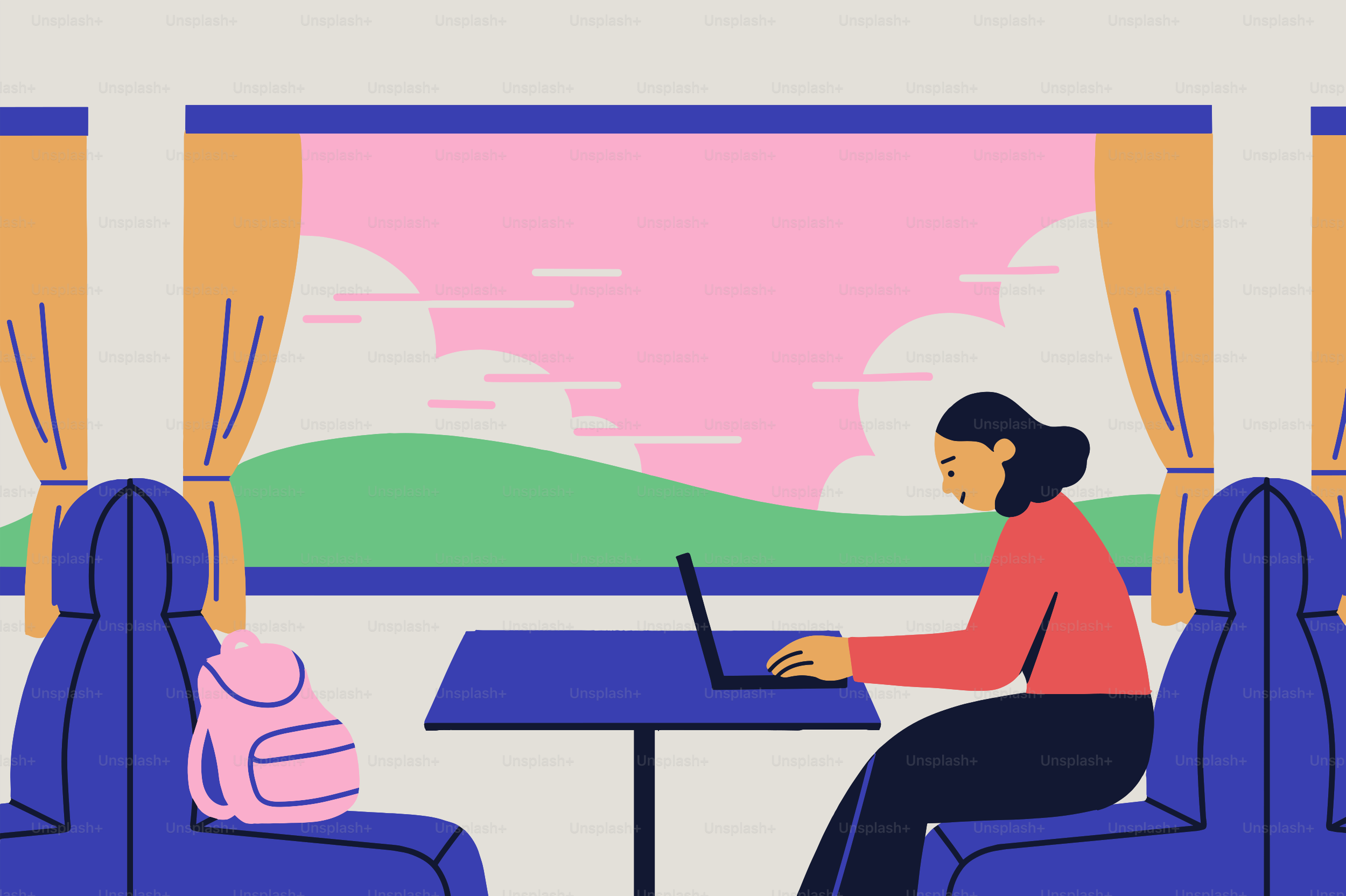 Wanita bekerja di laptop di dalam kereta dengan pemandangan indah