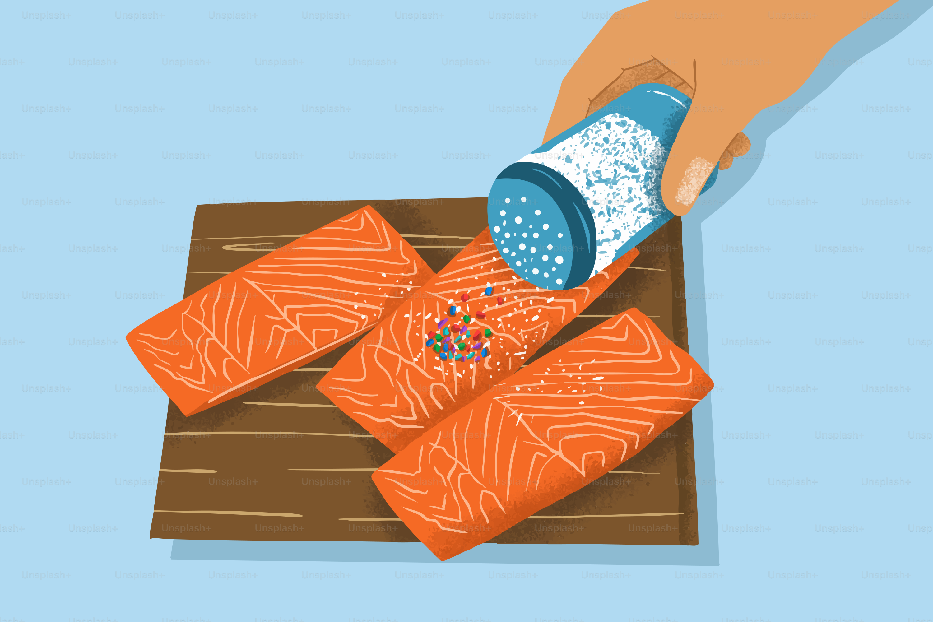 Hand seasoning salmon fillets on a wooden board.