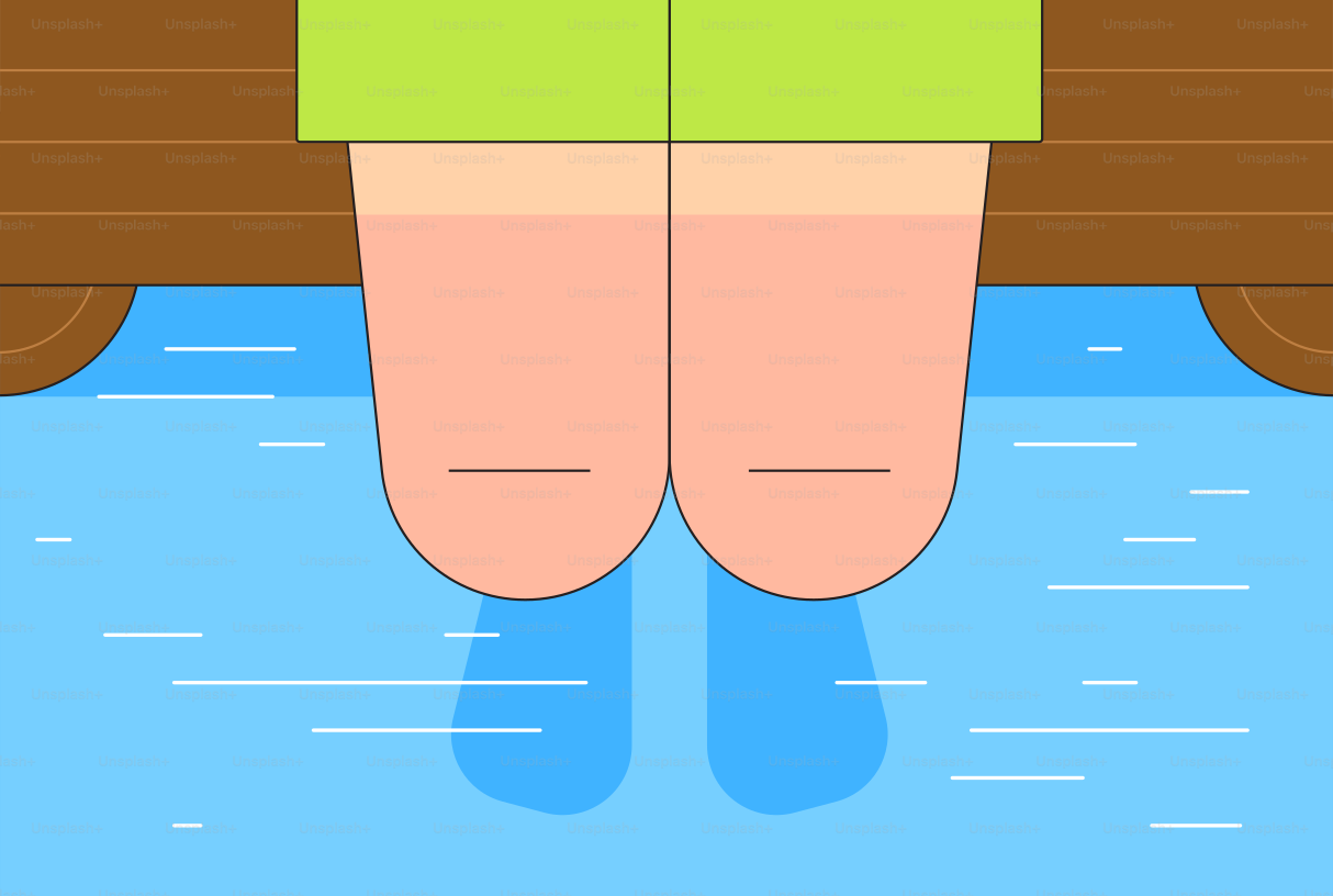 Feet dangling over water from a wooden dock.