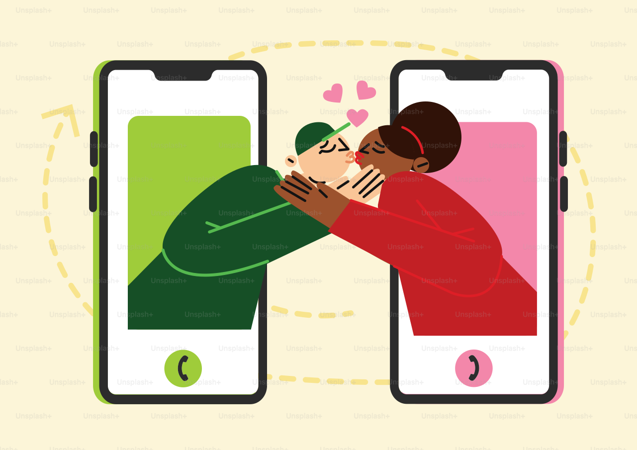 ビデオ通話中にスマートフォン越しにキスをしているカップル。