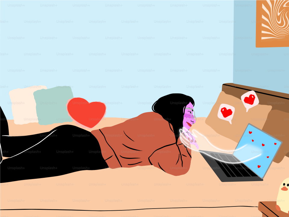 Woman on bed looking at laptop with hearts