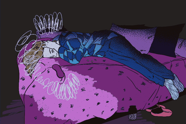 Person lying on bed with dizzy swirls