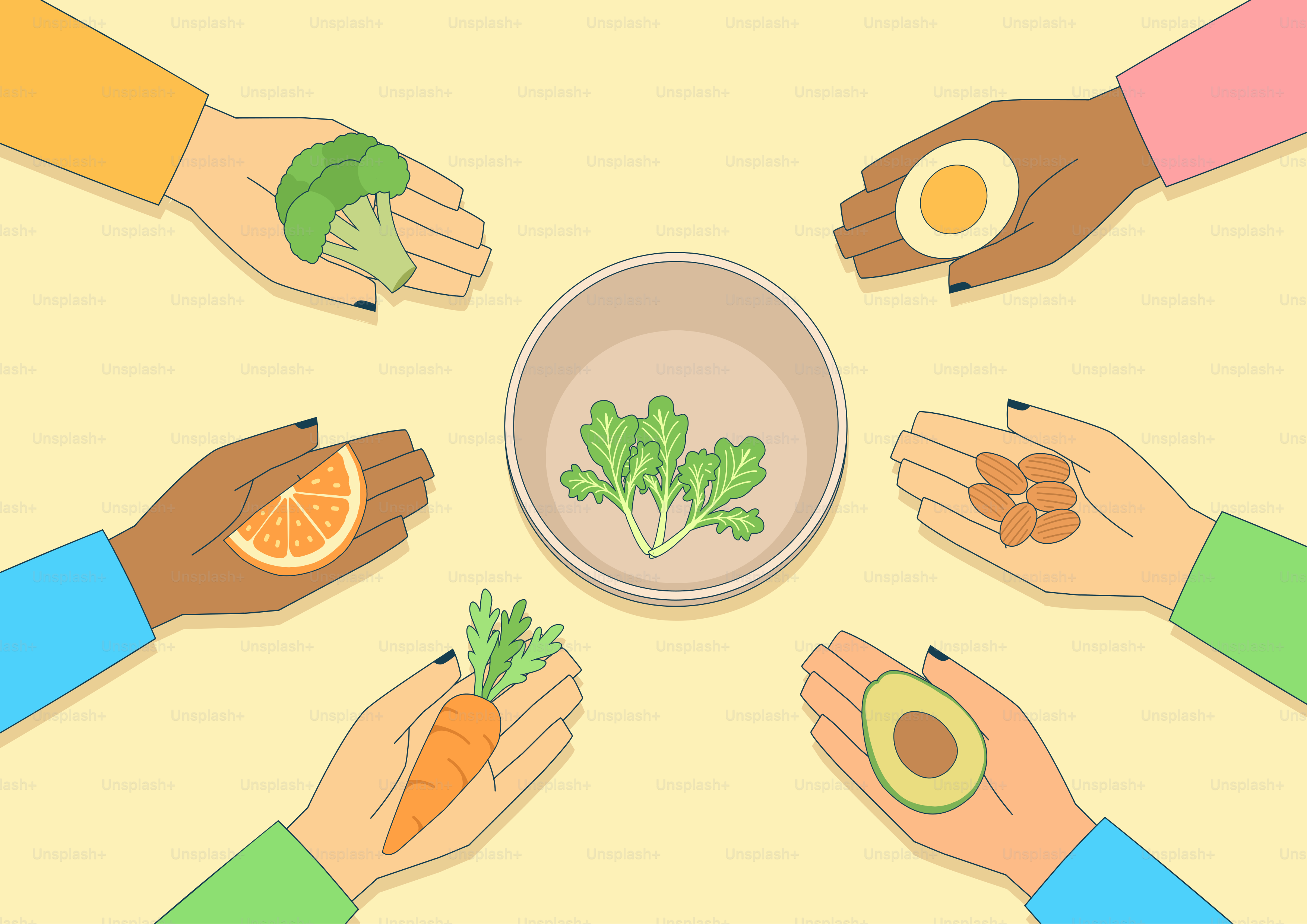 Manos sosteniendo varios alimentos saludables alrededor de un bol de verduras.