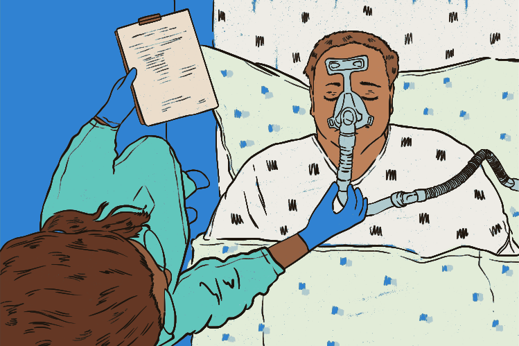Doctor checks on patient with breathing mask in hospital
