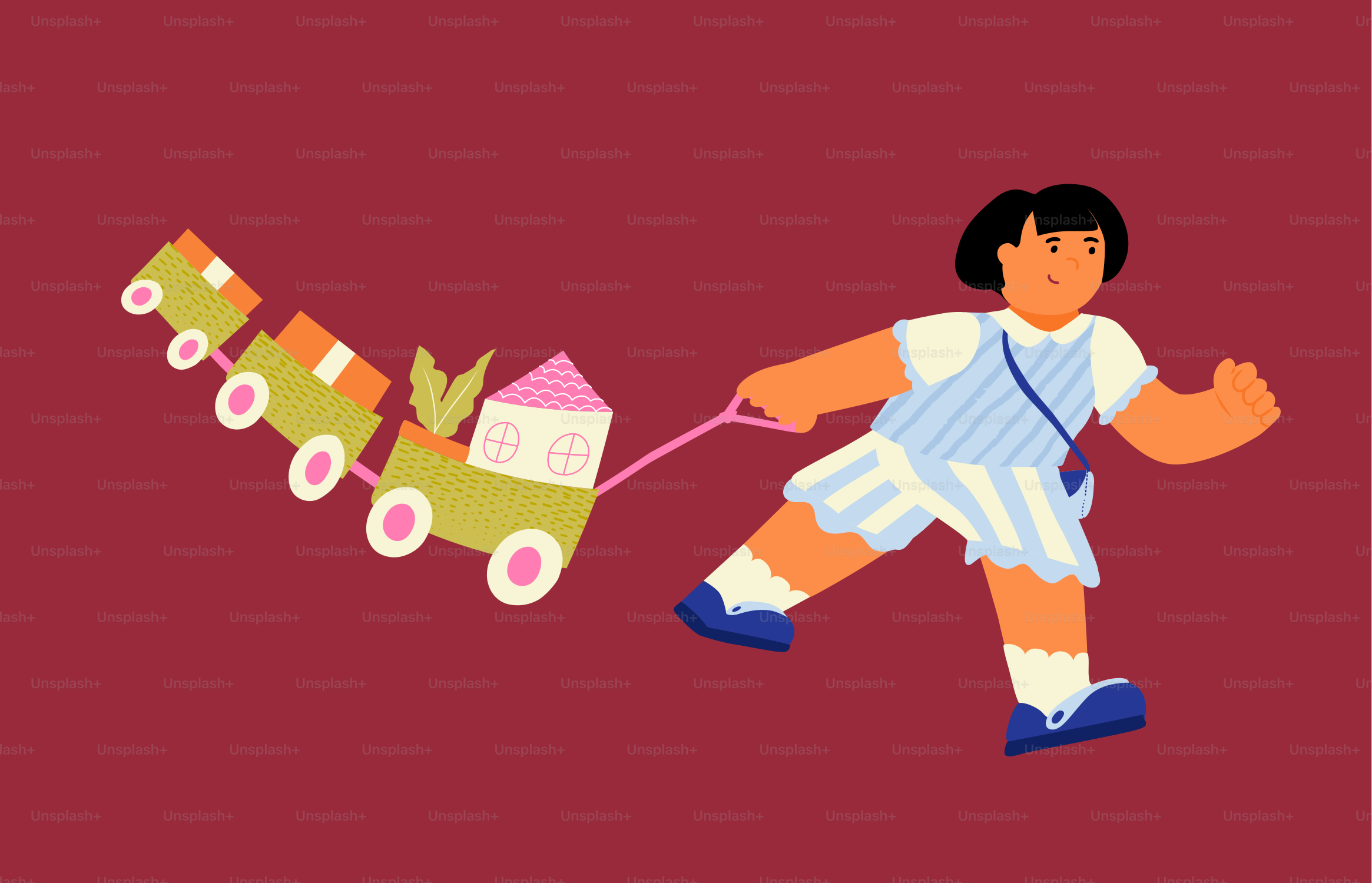 子供が家のついたおもちゃの列車を引っ張っています。