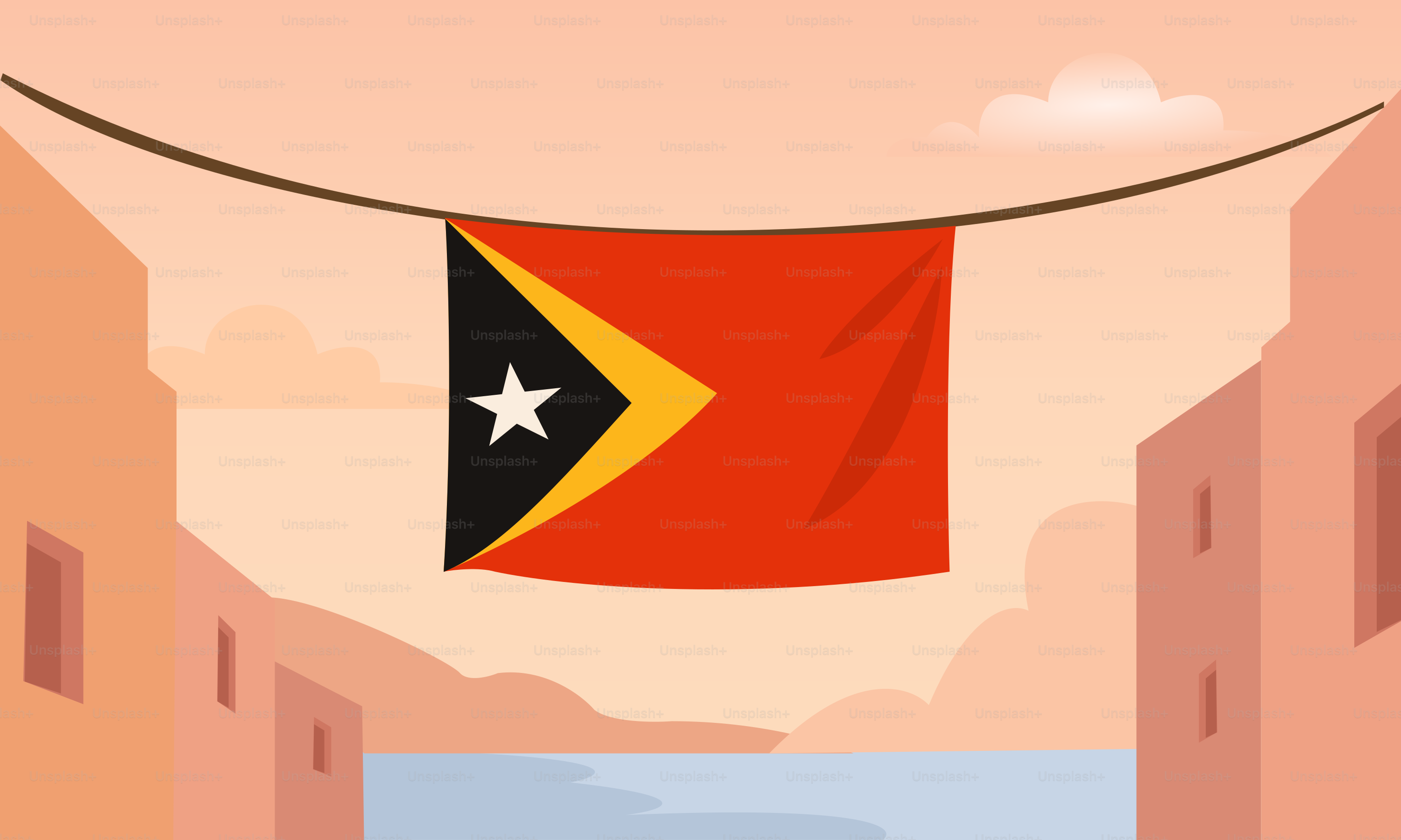 Le drapeau du Timor oriental est suspendu entre deux bâtiments