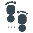 Two stylized dark grey footprints on a white background.