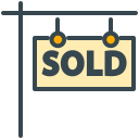 A "sold" sign hanging from a post.