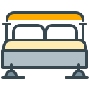 A stylized icon of a bed with two pillows.