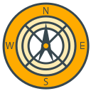 An orange and dark grey compass showing cardinal directions.