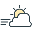 Windy weather icon with sun and cloud.