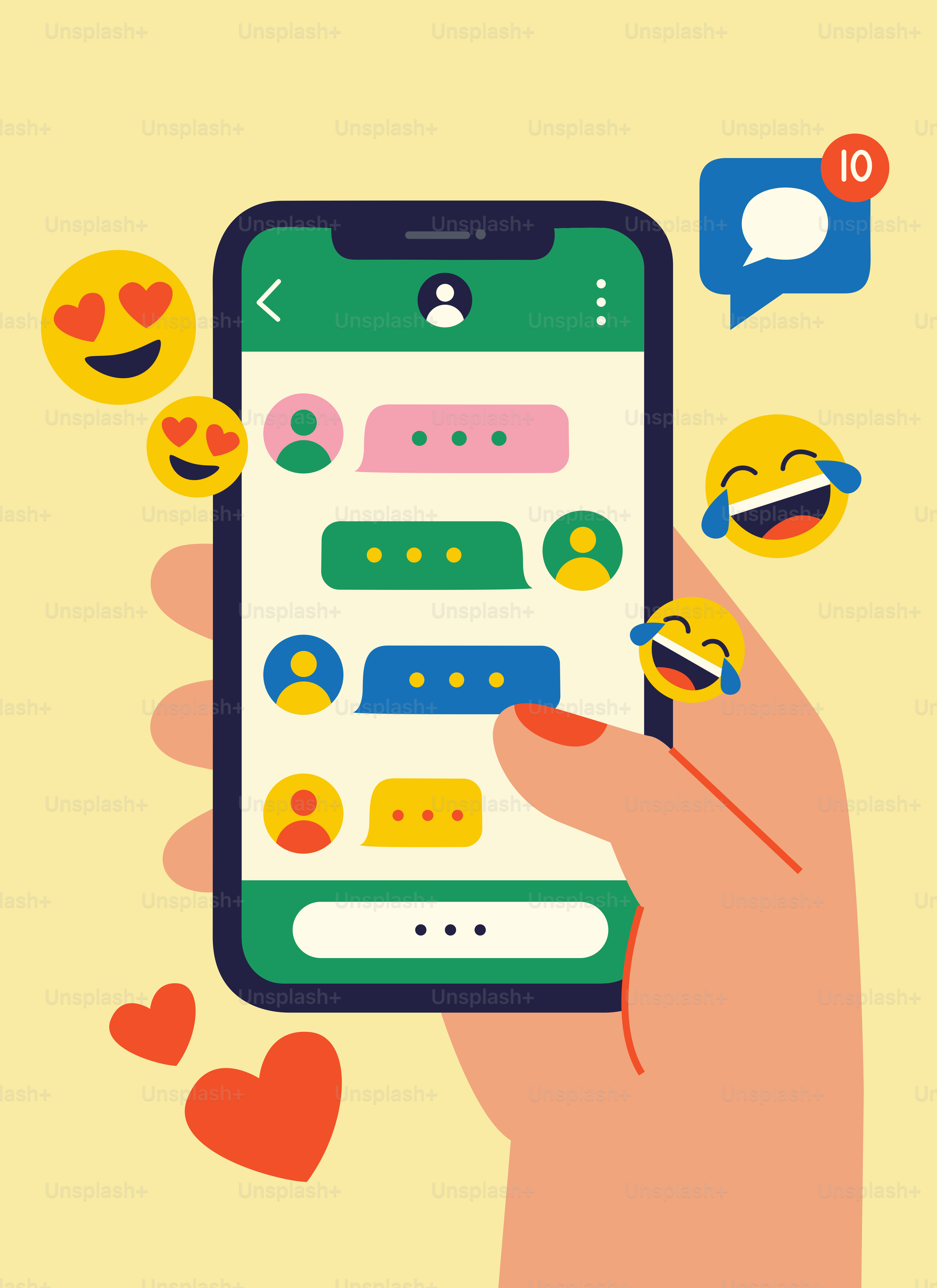 Hand holding a smartphone displaying chat messages and emojis.