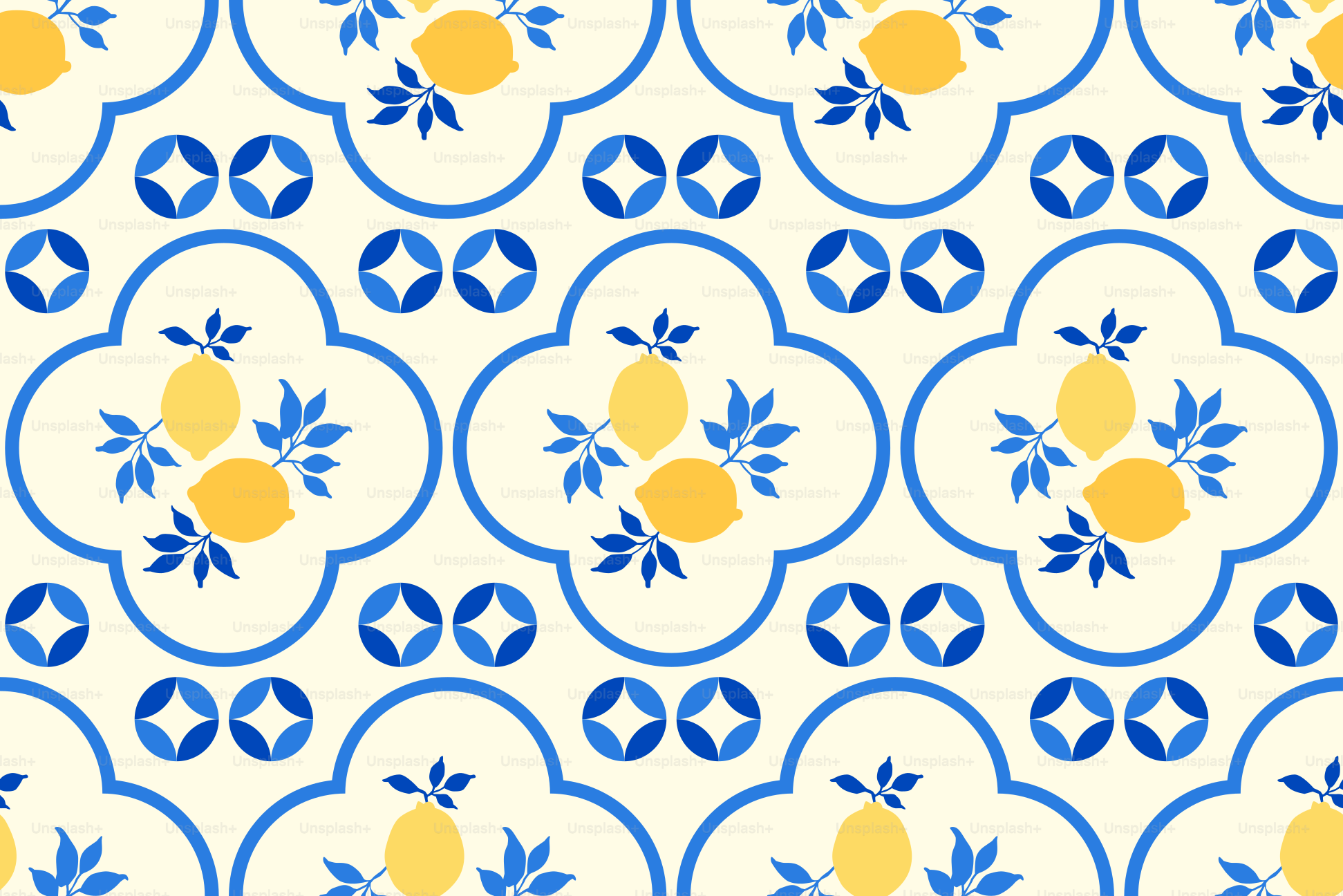 A repeating pattern of yellow lemons and blue quatrefoils.