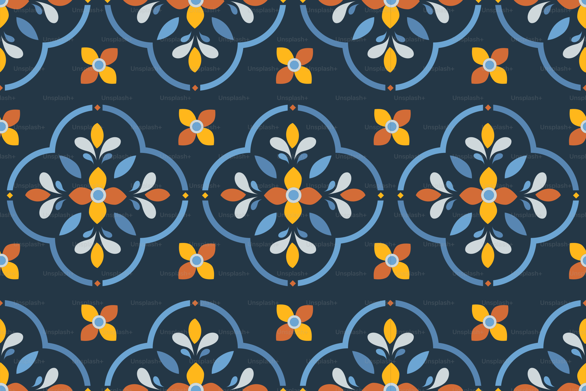 Seamless dark blue pattern with colorful floral quatrefoil motifs.