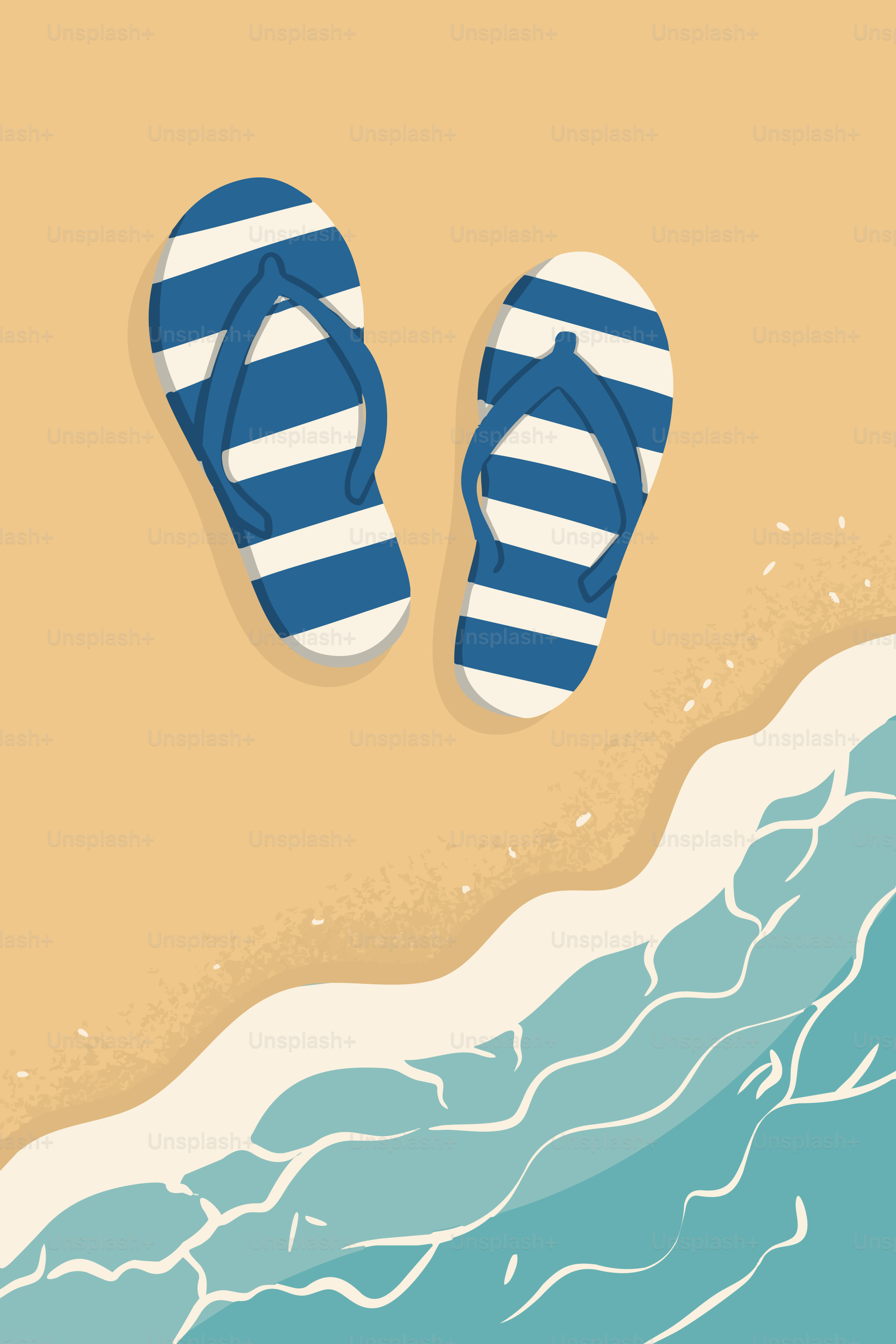 Blue and white striped flip-flops on sand by ocean.