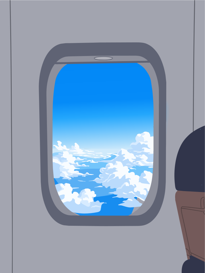 飛行機の窓から見える青空と雲の景色。