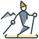 Seseorang bermain ski dengan pegunungan di latar belakang.