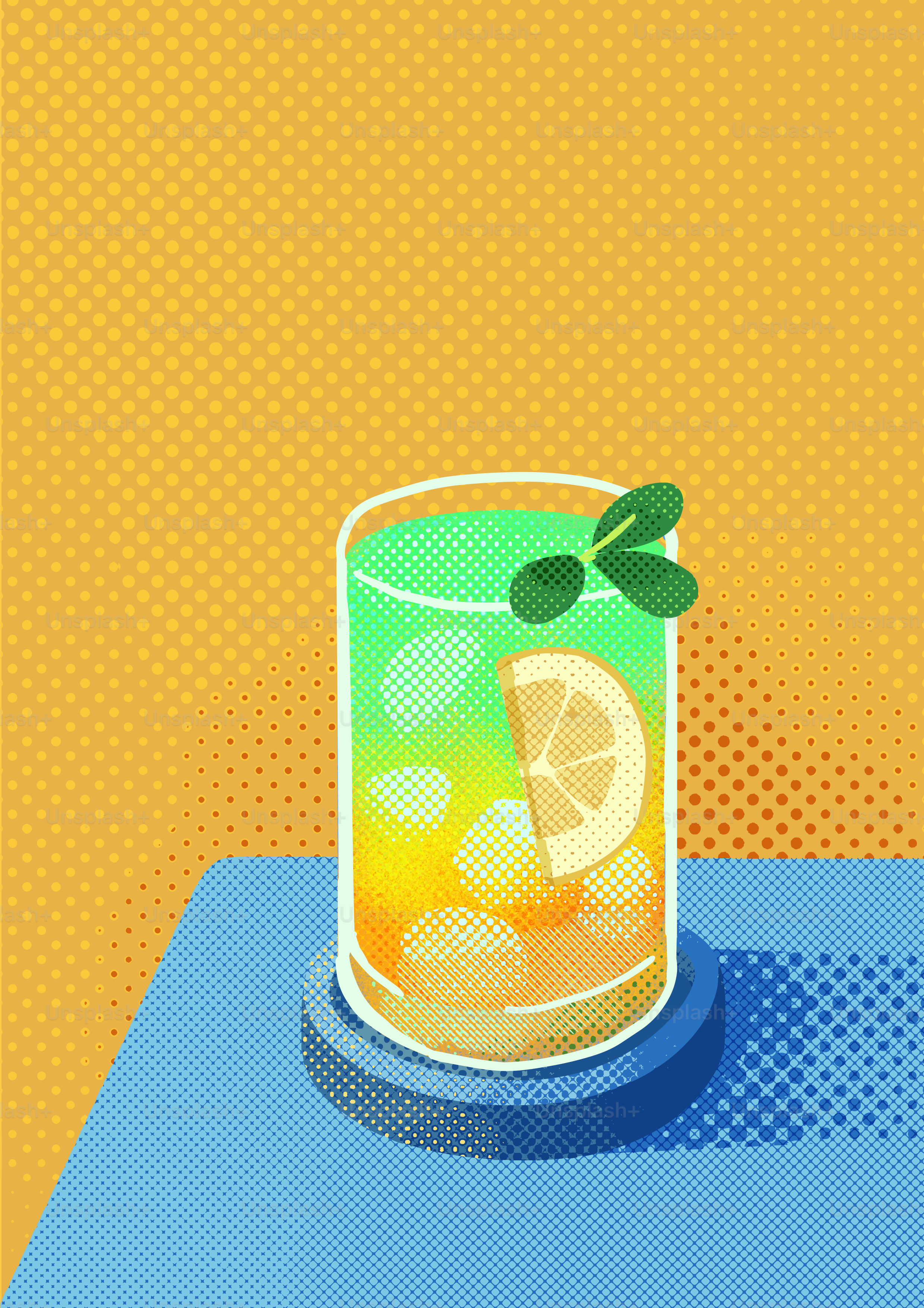 Bebida colorida con limón y menta sobre una mesa azul.