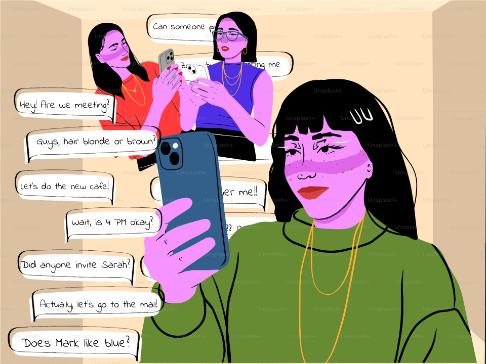 若い女性が携帯をチェックし、テキストメッセージや友人に囲まれている。
