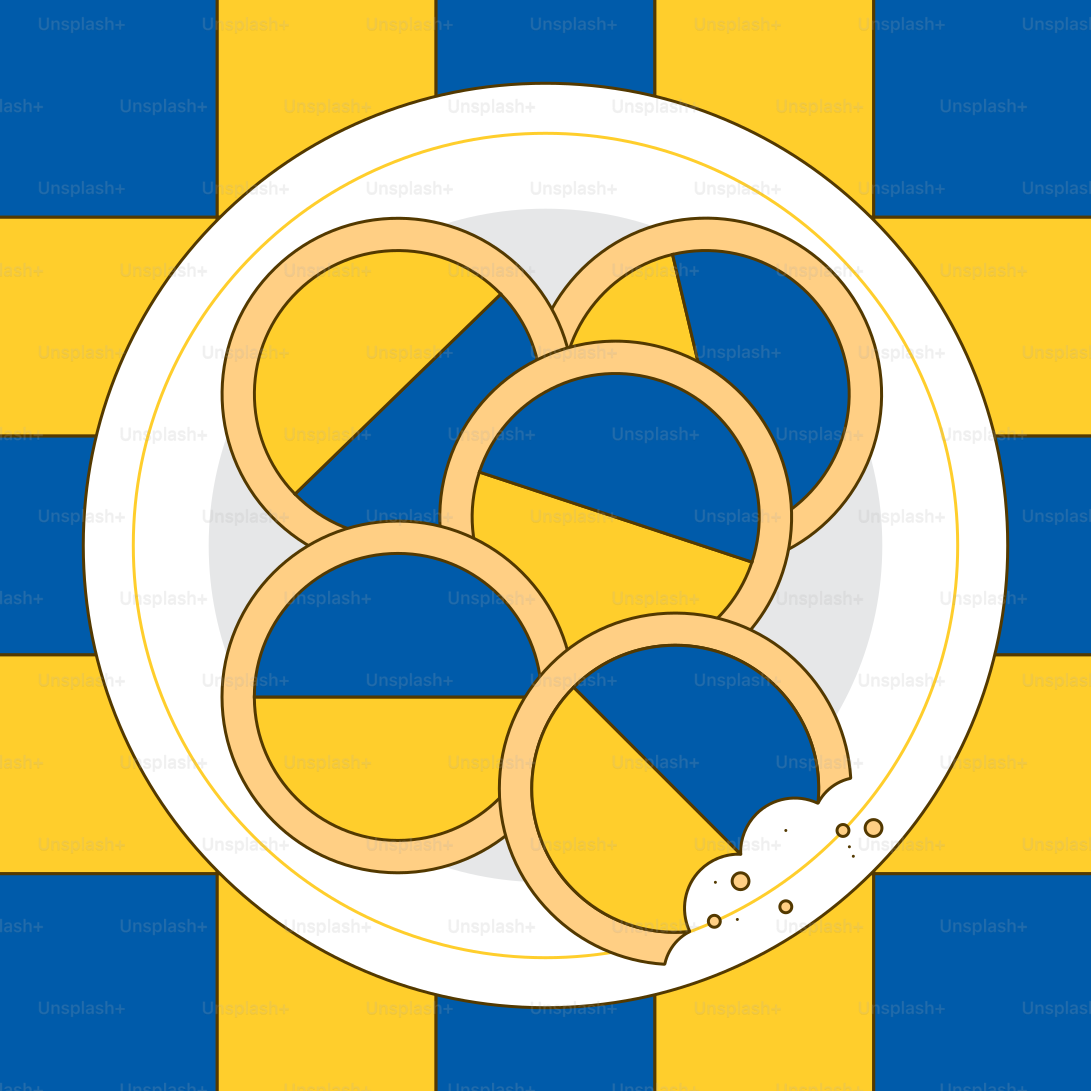 Kekse mit der ukrainischen Flagge auf dem Teller, ein bissen