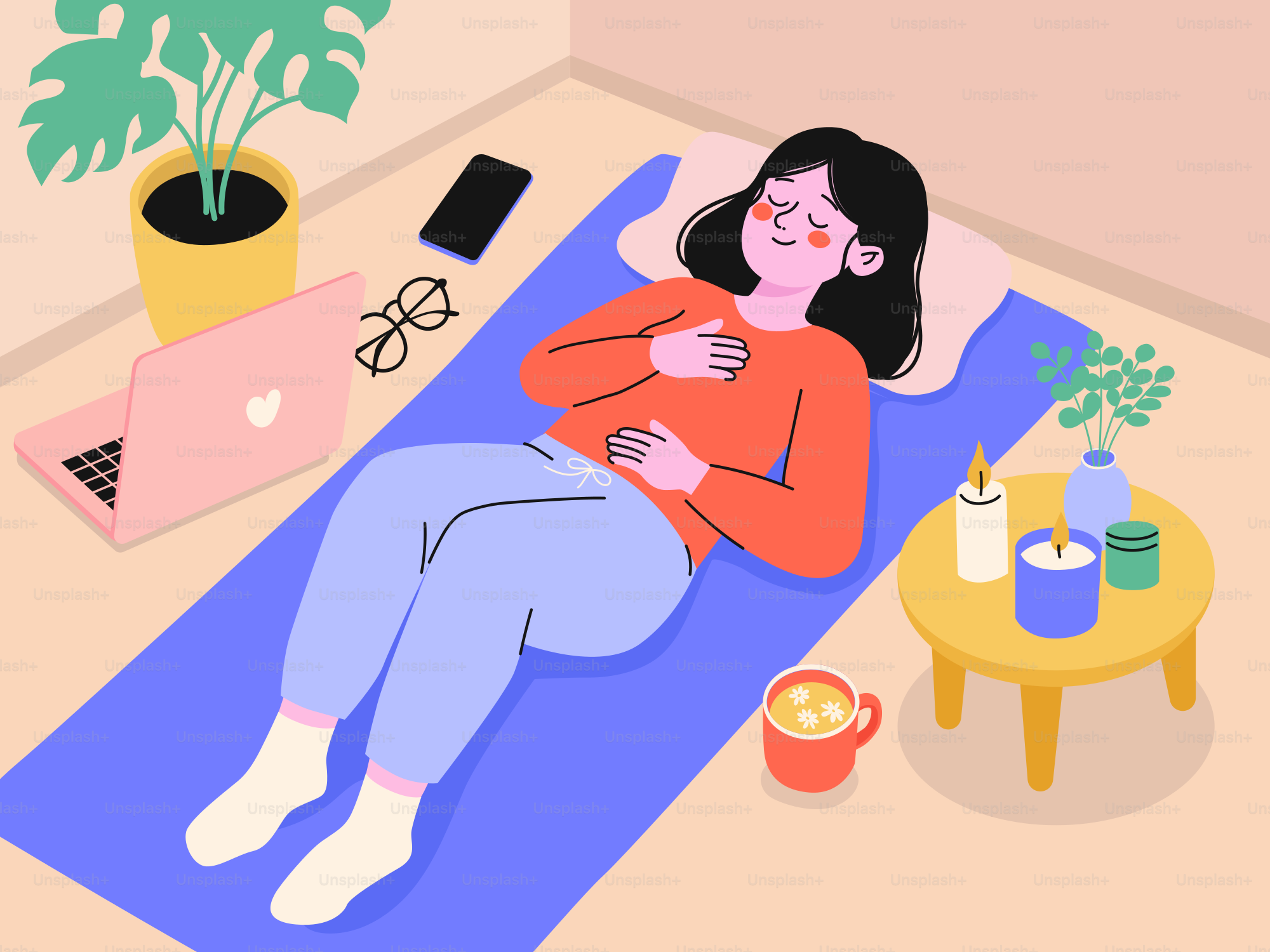 Woman meditating on yoga mat with candles