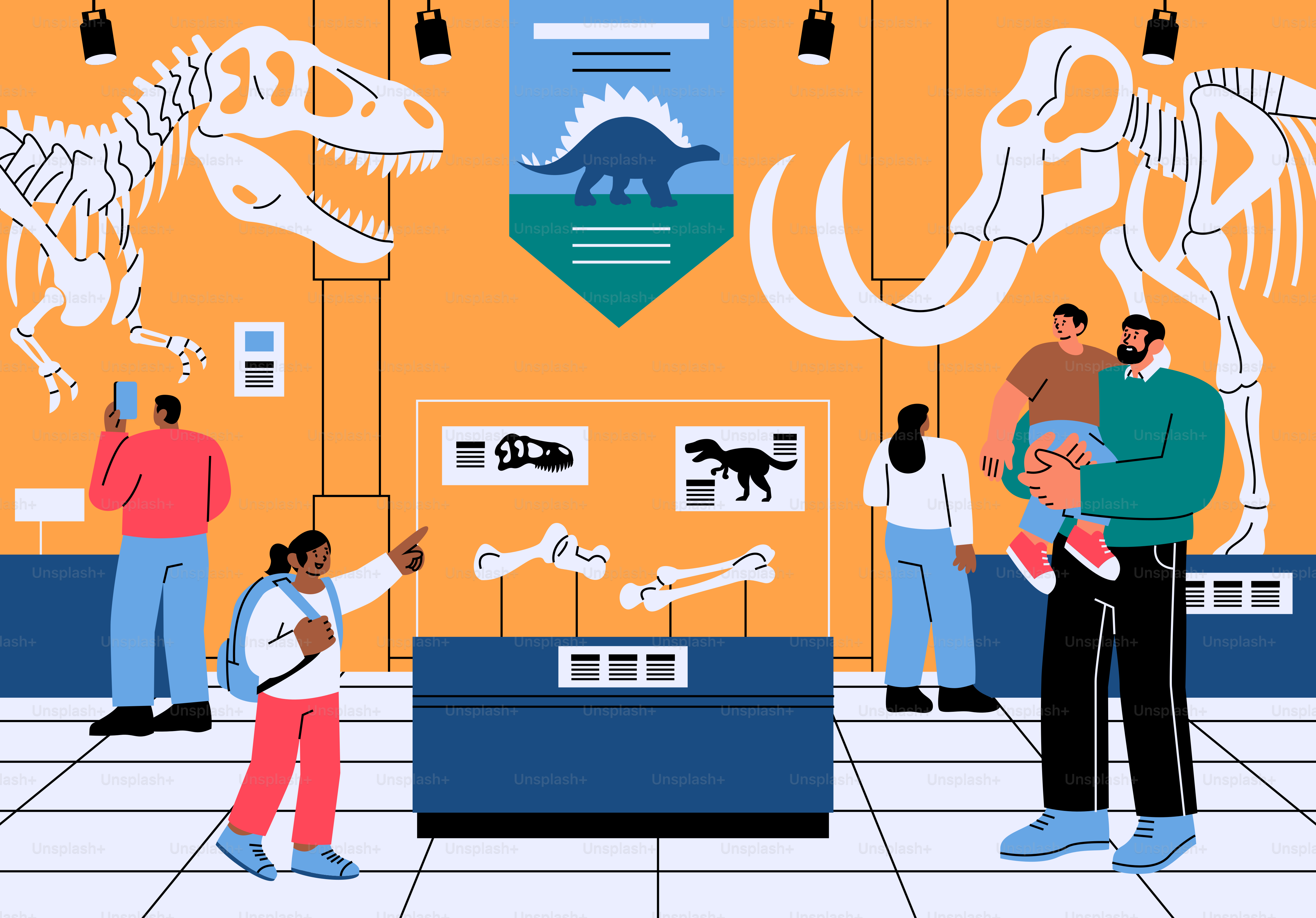 Eine Familie und andere Besucher in einem Museum mit Dinosaurier- und Mammutskeletten.