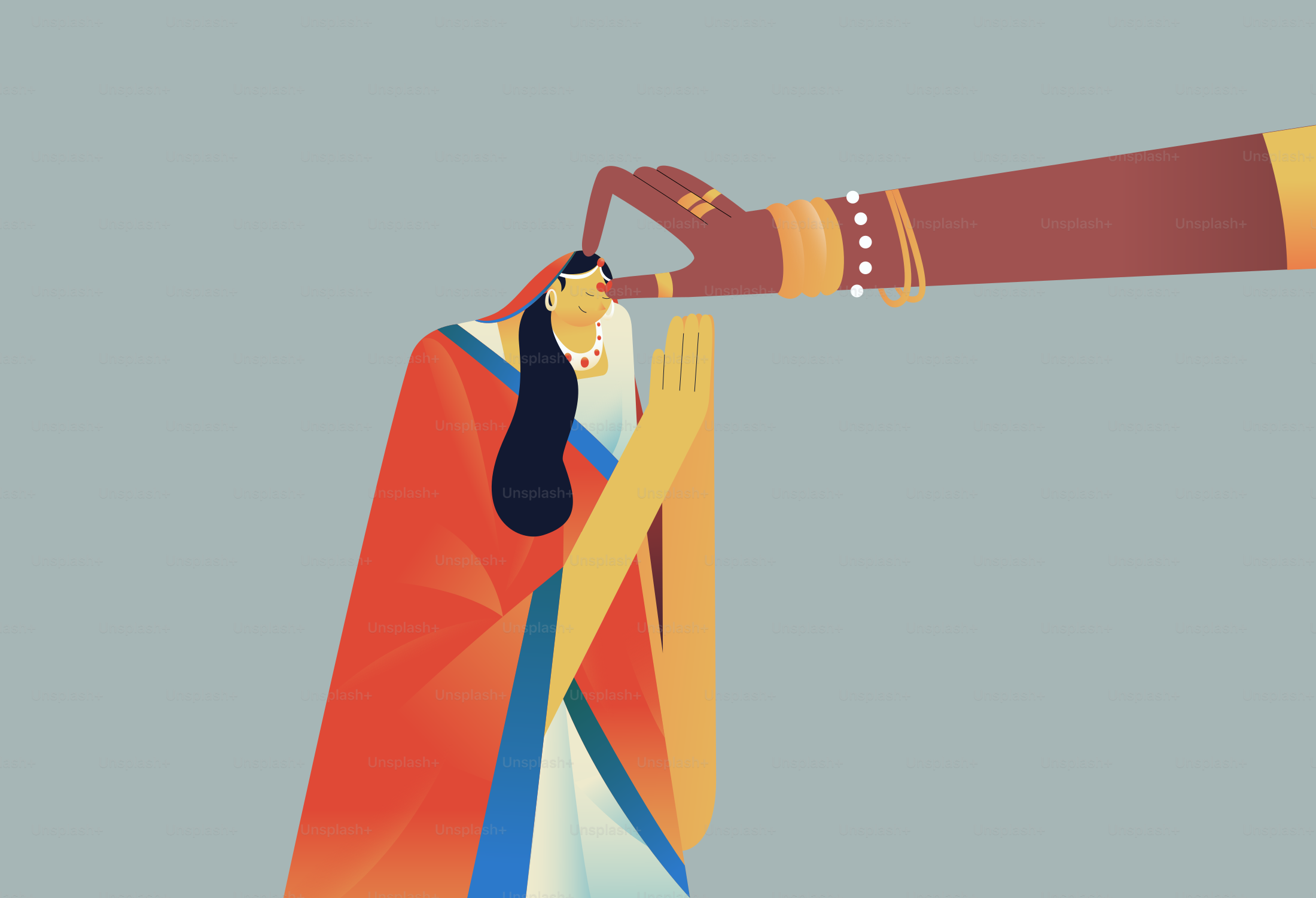 Una persona in un sari rosso con le mani intrecciate che riceve un bindi