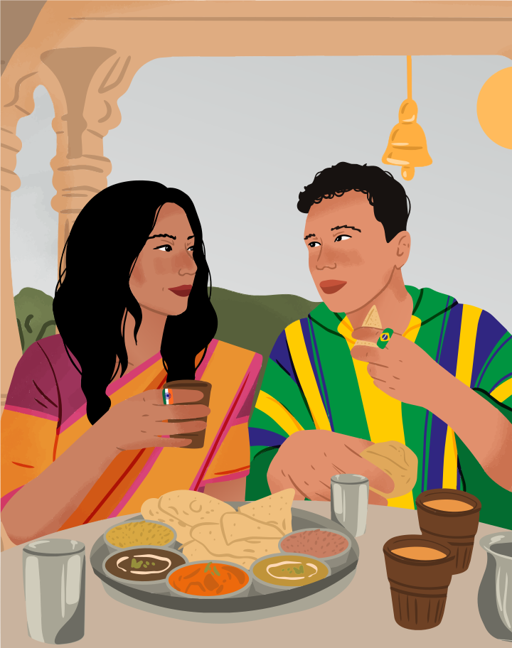 A woman and a man eating a meal together at a table
