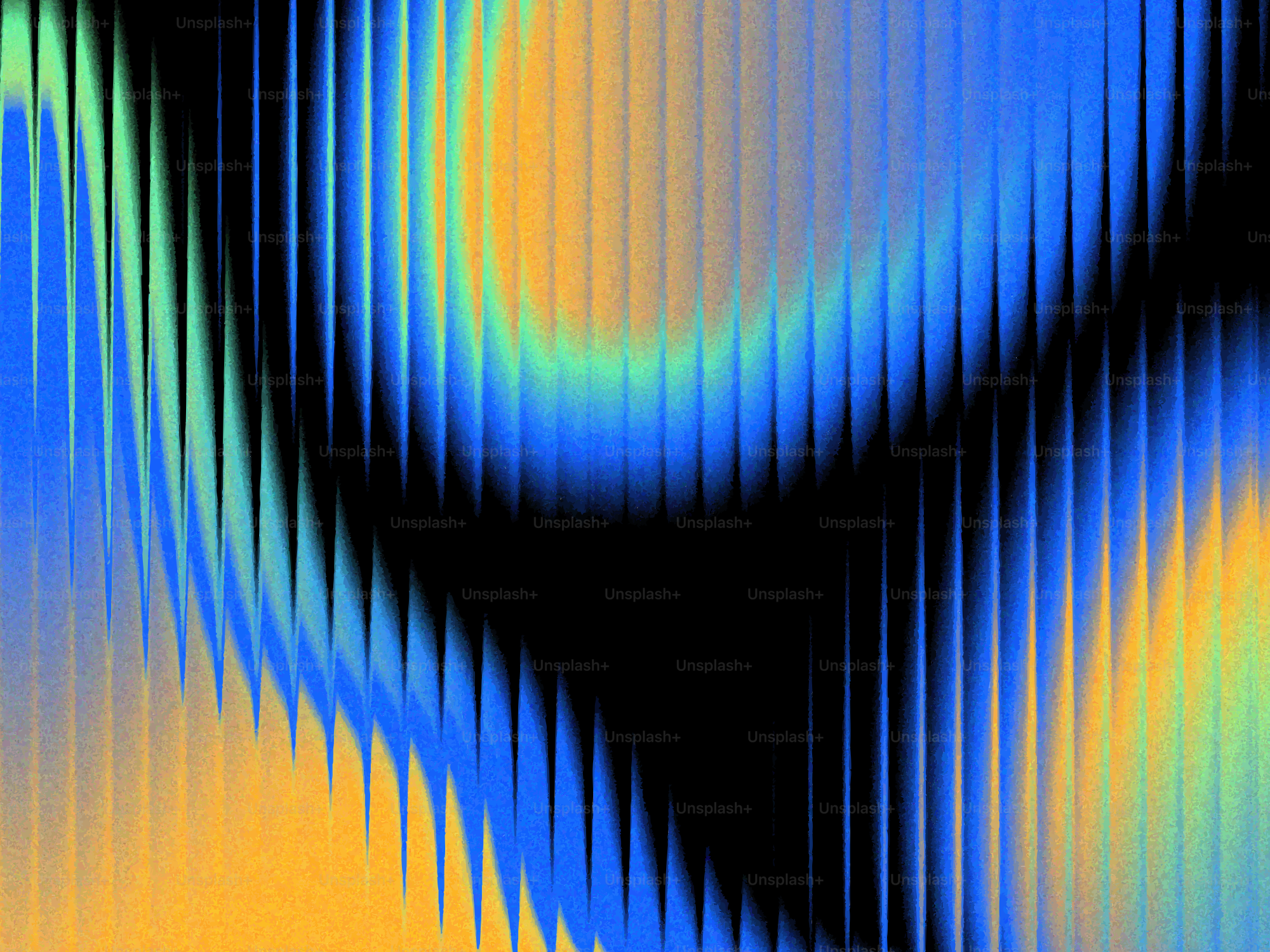 Des vagues verticales abstraites de lumière bleue, verte et orange sur un fond noir