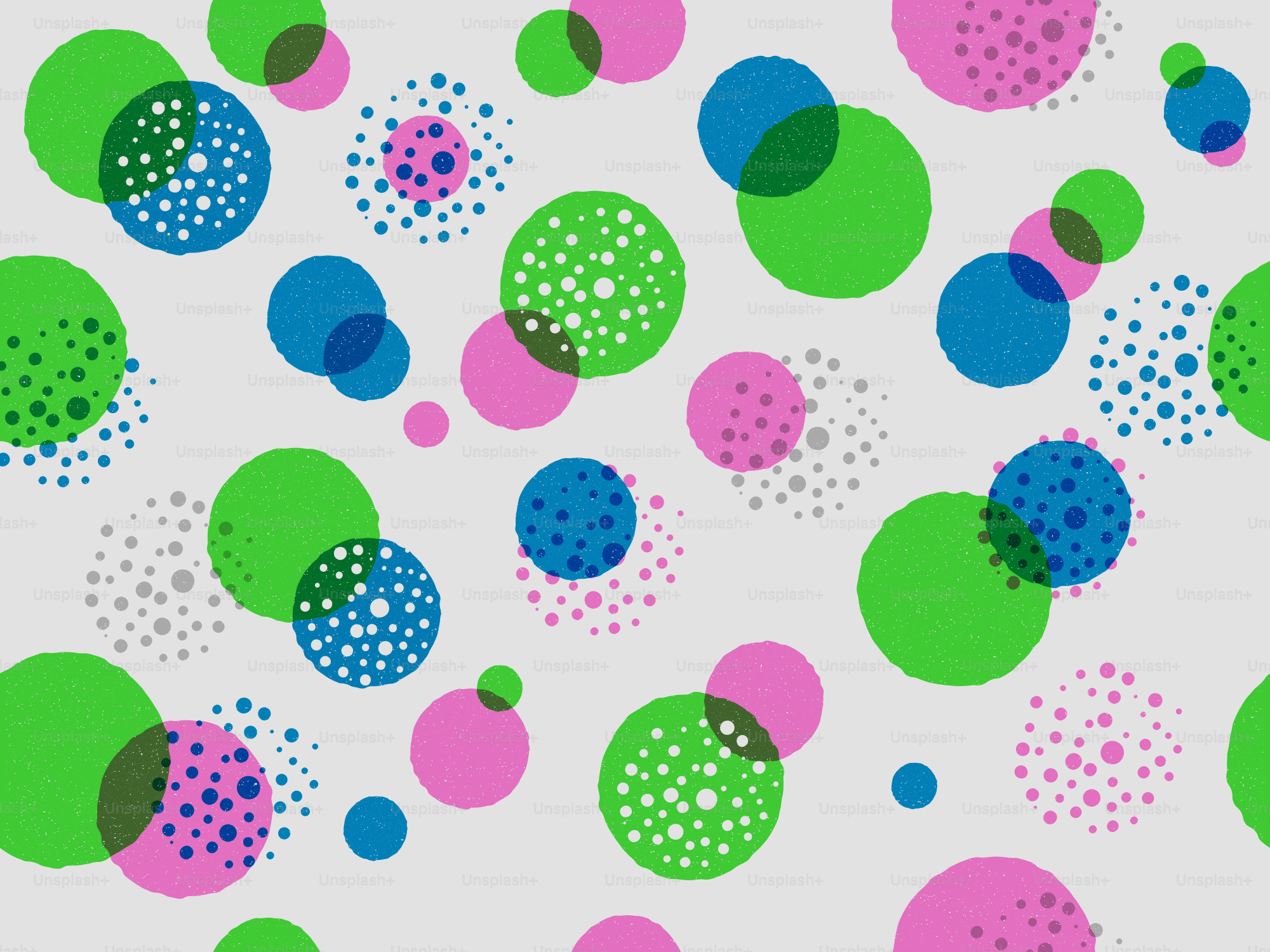 Un motif de cercles verts, bleus et roses qui se chevauchent avec diverses textures de points sur un fond gris clair
